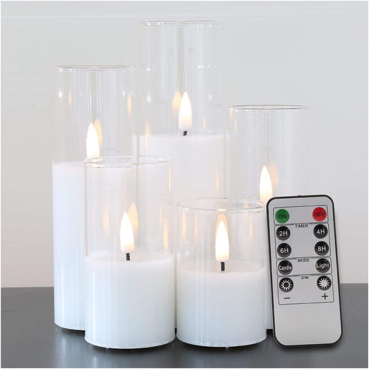 A set of five slim, clear glass flameless candles comes with a remote