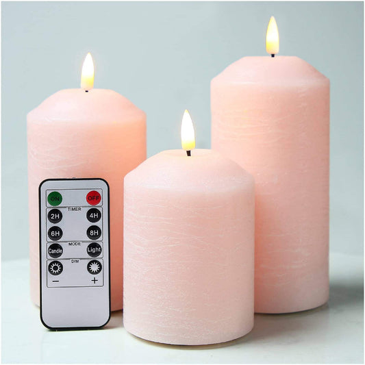 a set of 3 eywamage blush pink flameless pillar candles with a remote