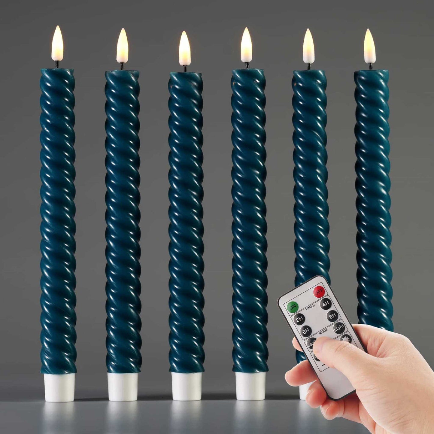 A set of 6 eywamage blue spiral flameless taper candles with a remote