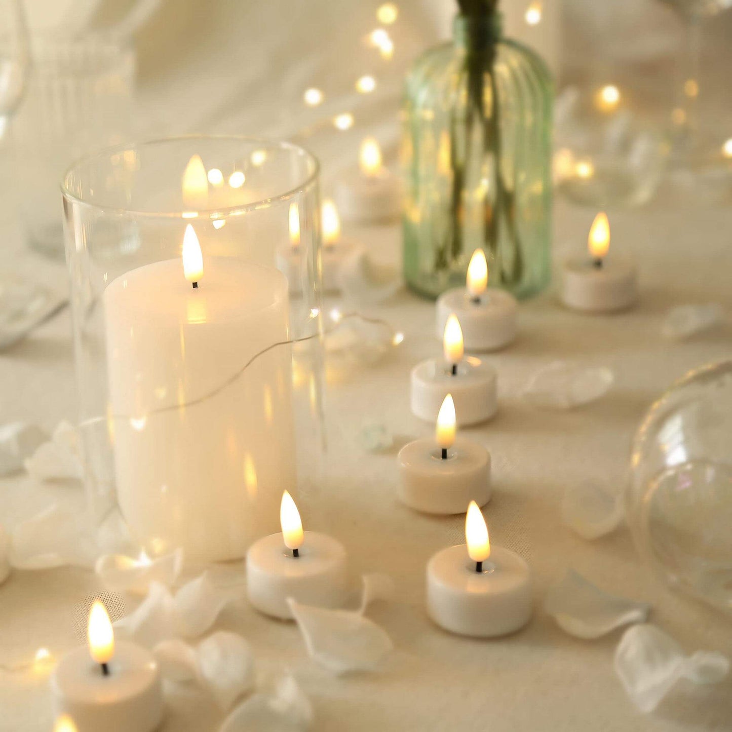 a dining table set using eywamage white pillared flat top candles and electronic tea lights